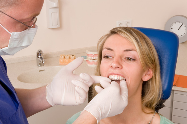 Woman being fitted for braces