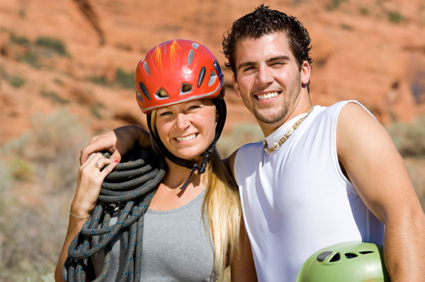 Couple rock climbing