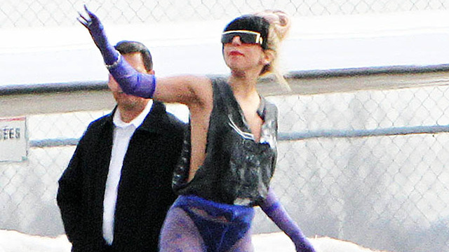 Lady Gaga with black bangs and a hugh bun hairstyle