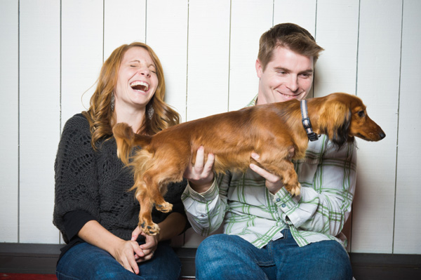 Laughing couple with dog