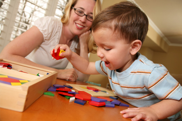 mom and toddler playing