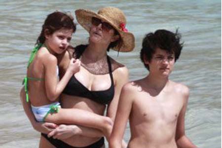 Stephanie Seymour hits the beach with her son