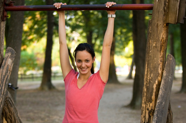 Woman doing pull ups