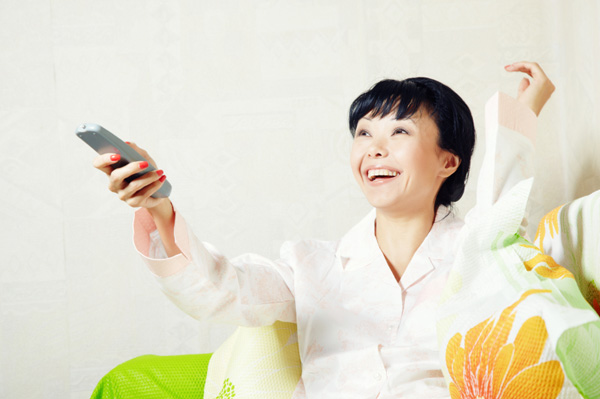 Woman watching chick flicks