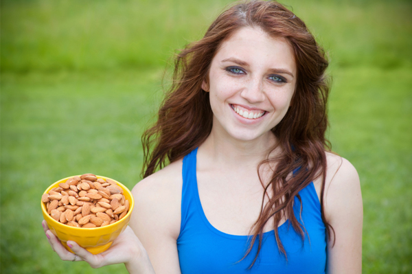 Woman with almonds