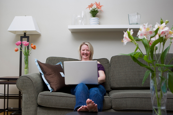 Woman with flowers on computer