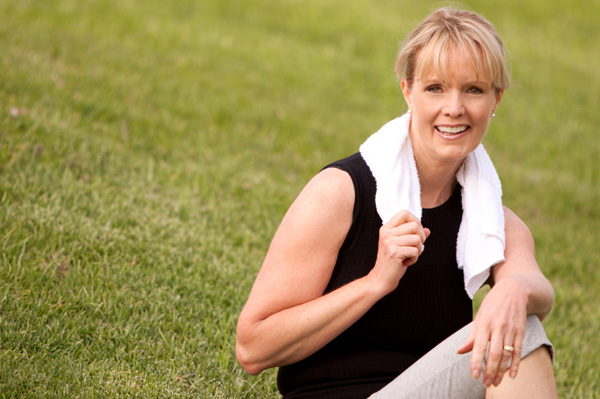 Fit mature woman exercsiing