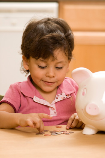 Little girl counting change
