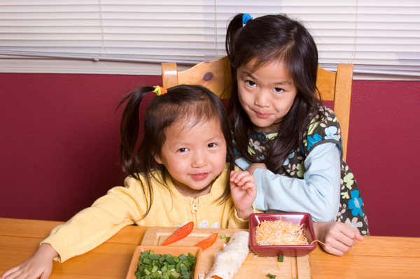Little girls making sandwich