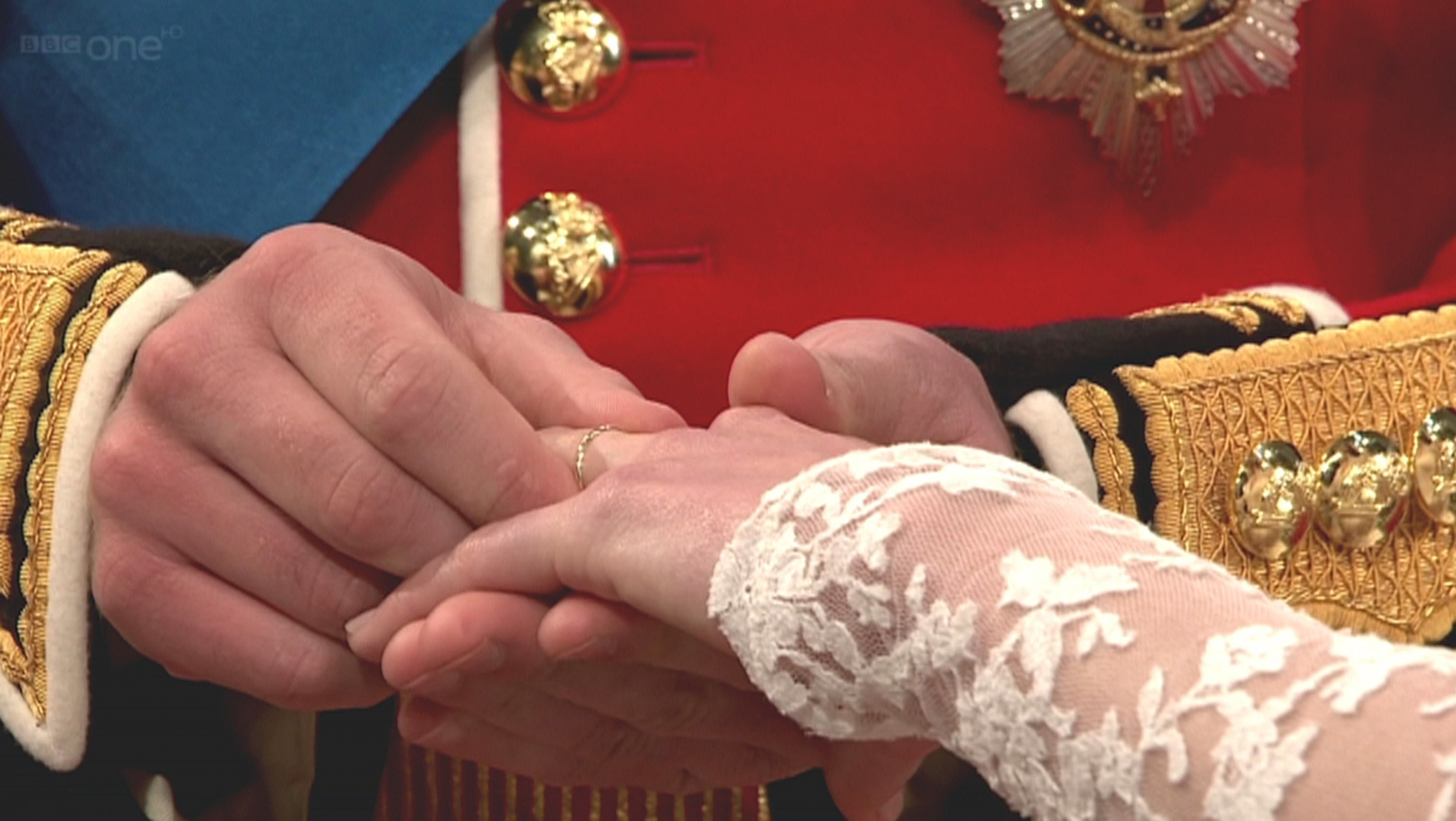 Prince William puts wedding ring on Kate Middleton's well manicured finger