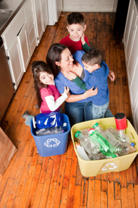 Mom and kids recycling