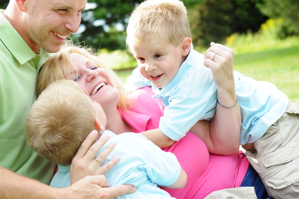 Mom laughing with kids