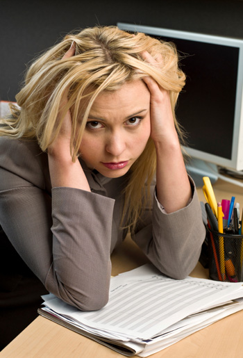 Unhappy woman at work
