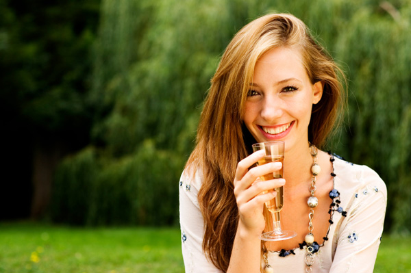 Woman drinking champagne