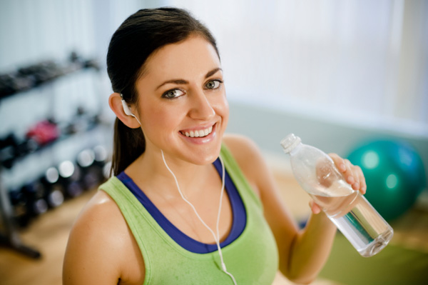 Woman drinking after workout