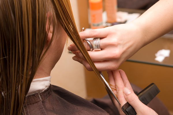 Woman getting angled haircut