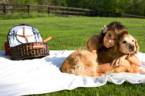 Woman having picnic with dog