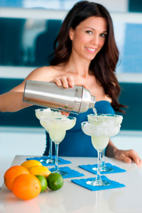 Woman making margarita