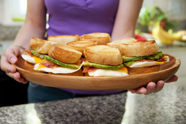 Woman making sandwiches for dinner