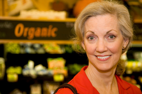 Woman shopping for organic produce
