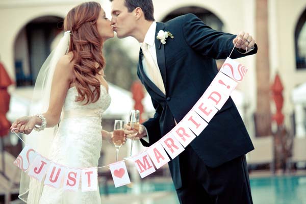 Bride and groom just married, off to their honeymoon