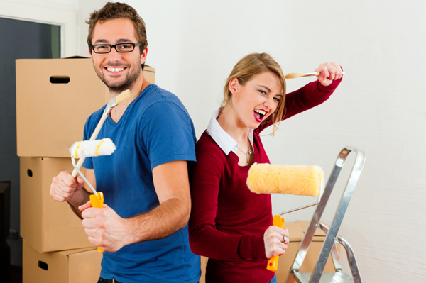 Couple moving in together and decorating