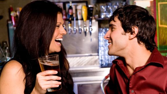 Guy and gal flirting