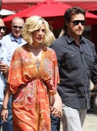 Tori Spelling's tattoo reads: Tori Spelling's tattoo reads: