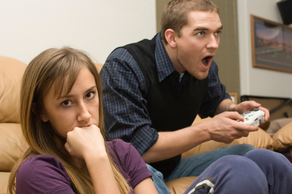 Woman dating video game fanatic