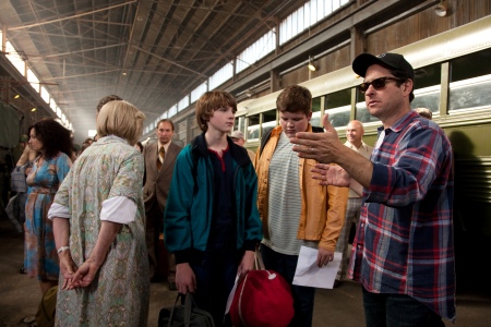 The boys of Super 8 listen to director J.J. Abrams on set