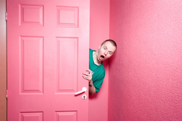 Man in pink room