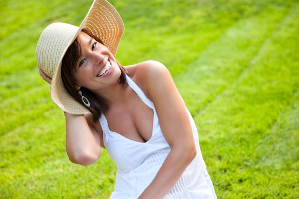Woman wearing summer hat