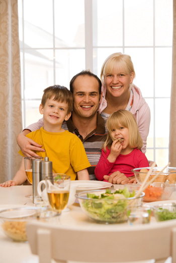 Young family eating dinner