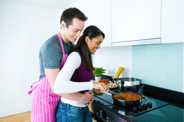 couple cooking for date night