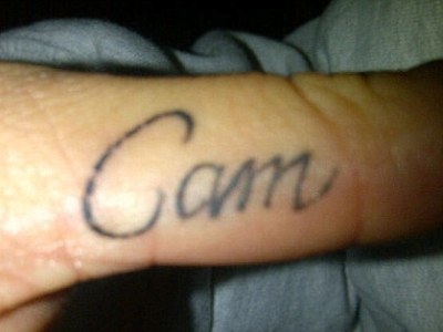 Amber Rose Wiz Khalifa get finger tattoos of love