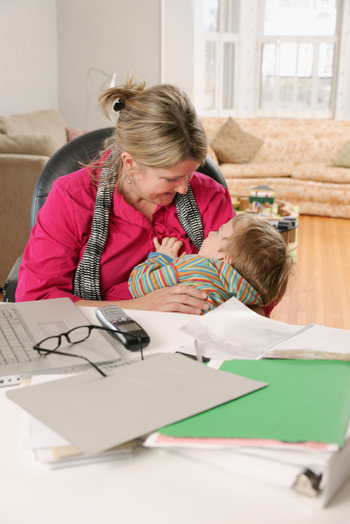 Mom working from home with toddler