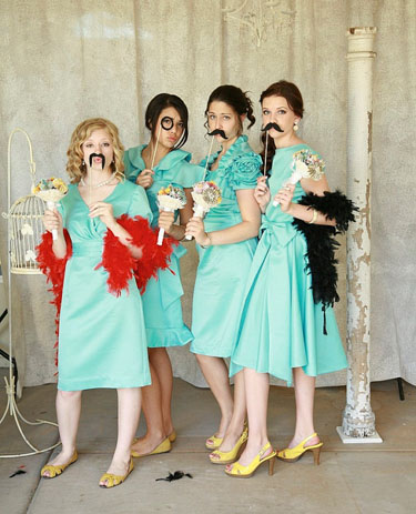 Unconventional wedding photo booth with props