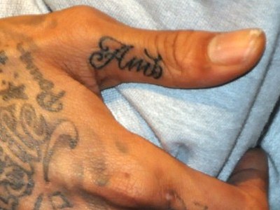 Think Amber and Wiz's finger tattoos match up together when they hold hands