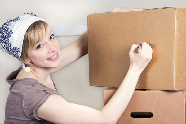 Woman labeling box