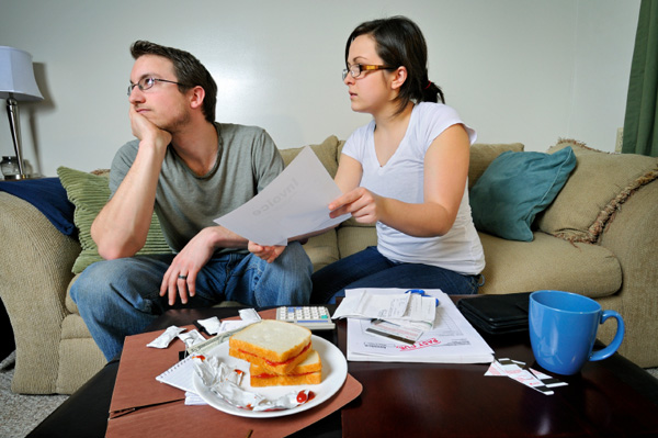 Woman nagging husband about budget