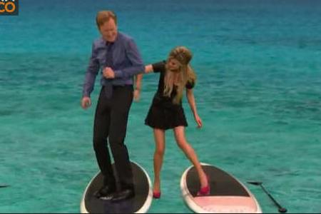 Marisa Miller gives Conan a spanking