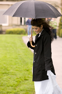 Bride in raincoat