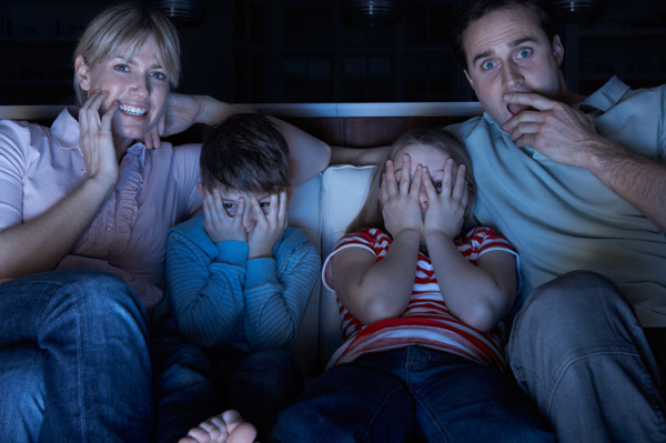Family watching scary movie