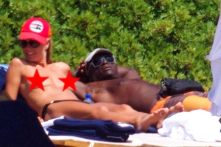 Heidi Klum goes topless in italy