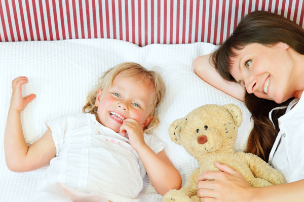 Mom napping with toddler