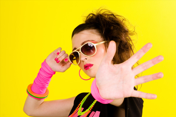 Teen in 1980s costume
