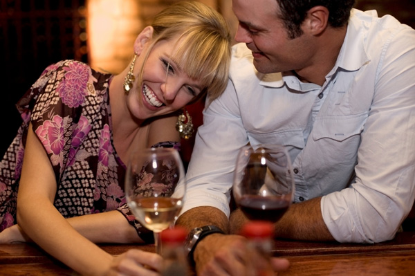 Woman flirting with man in bar
