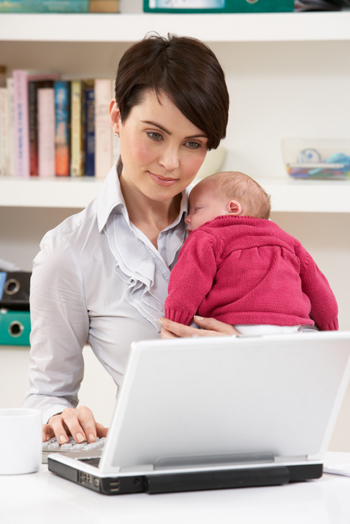 Working mom reading e-mail