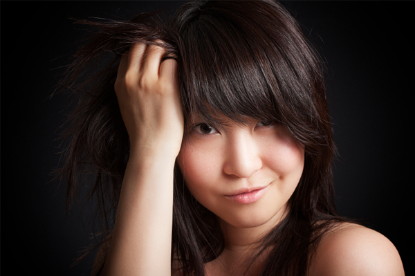 Woman touching hair