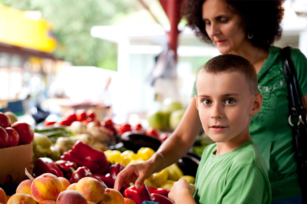 Mom and boy at farmer's market